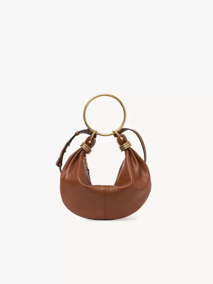 Kleine Hobo-Tasche mit Armband aus genarbtem Leder