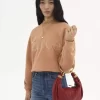 Kleine Hobo-Tasche mit Armband aus genarbtem Leder
