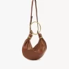 Kleine Hobo-Tasche mit Armband aus genarbtem Leder