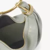 Kleine Hobo-Tasche mit Armband aus genarbtem Leder