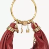 Kleine Hobo-Tasche mit Armband aus genarbtem Leder
