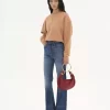 Kleine Hobo-Tasche mit Armband aus genarbtem Leder
