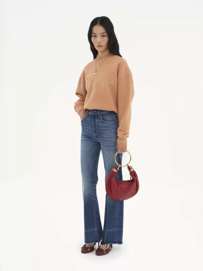 Kleine Hobo-Tasche mit Armband aus genarbtem Leder