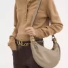 Kleine Hobo-Tasche mit Armband aus genarbtem Leder