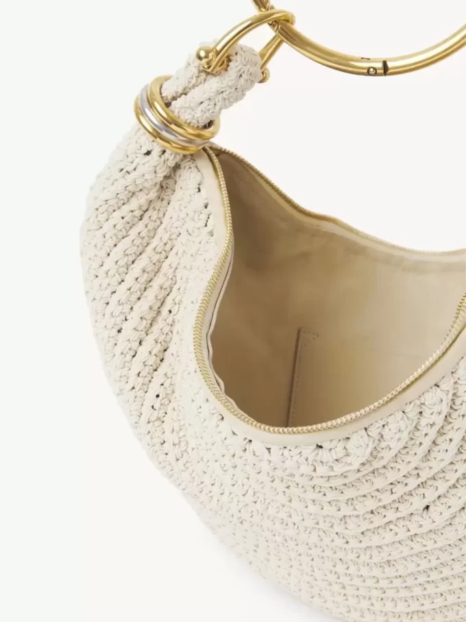 Kleine Hobo-Tasche mit Armband aus Häkelarbeit