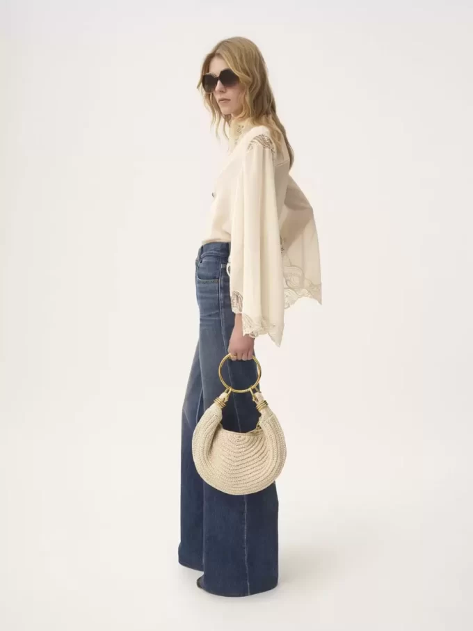 Kleine Hobo-Tasche mit Armband aus Häkelarbeit