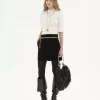 Kleine Hobo-Tasche mit Armband aus Leder mit Fransen
