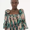 Langes Kleid mit Puffärmeln aus Seidenmousseline